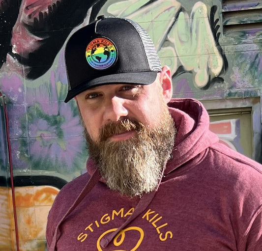 Stigmakills™ Trucker Hat - with pride support rainbow patch